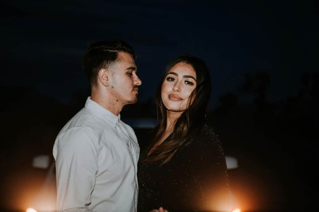A man looking at the woman