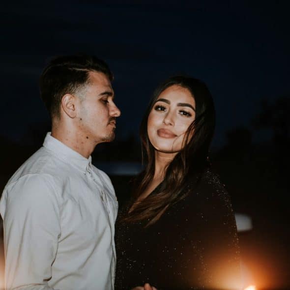 A man looking at the woman