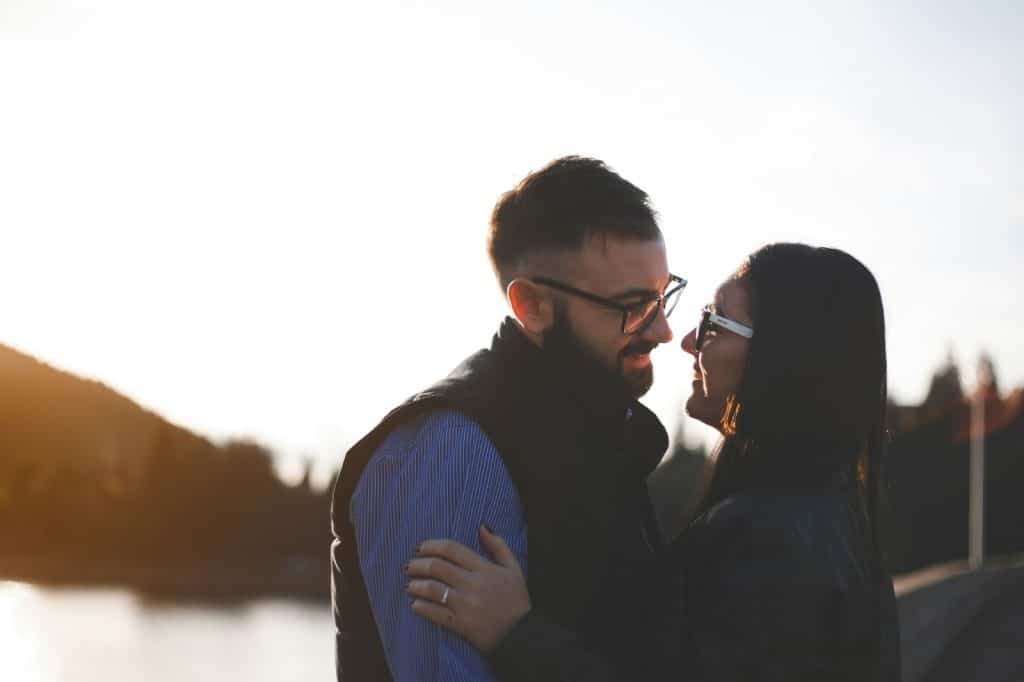 A man and woman facing each other