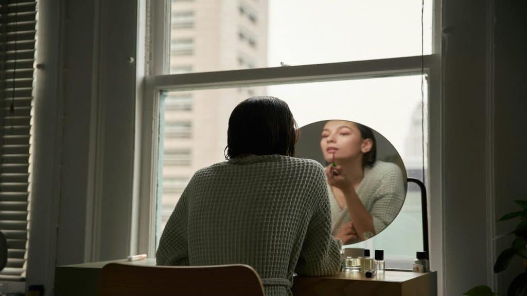 A woman getting ready to go out