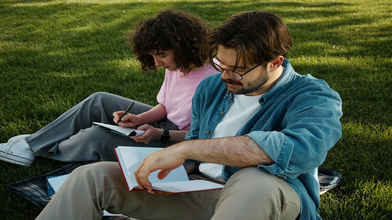 A couple listing down their goals.