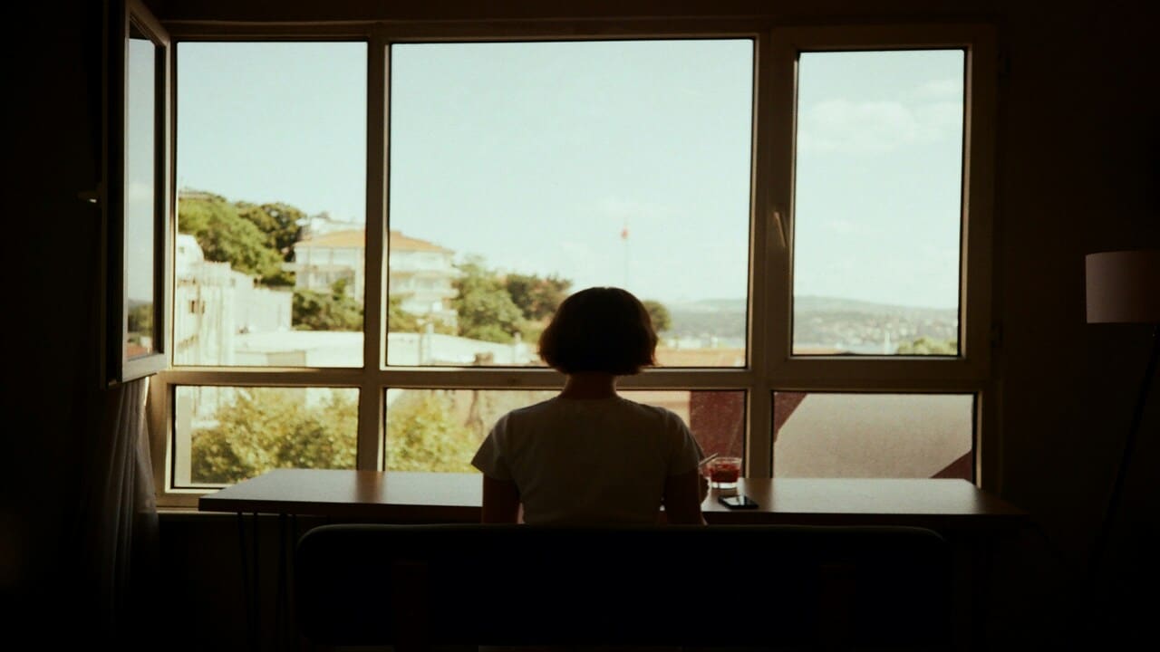 A woman looking out the window