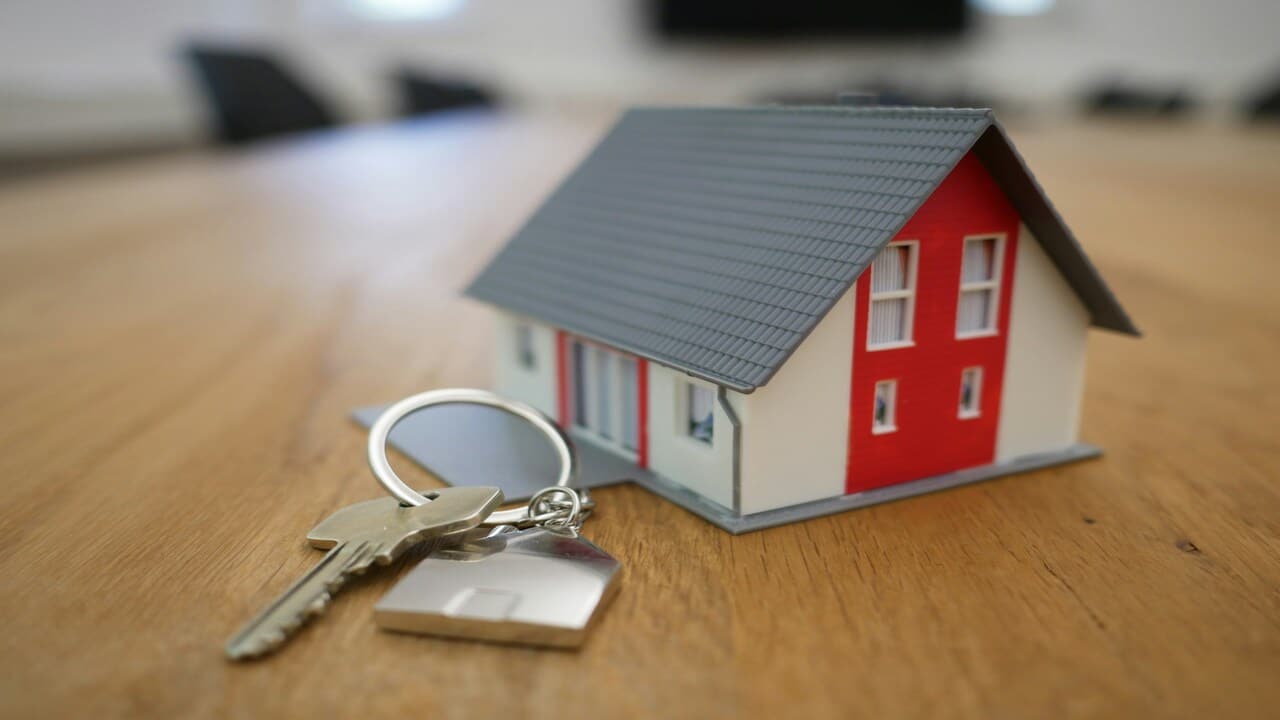 House keys near a toy house