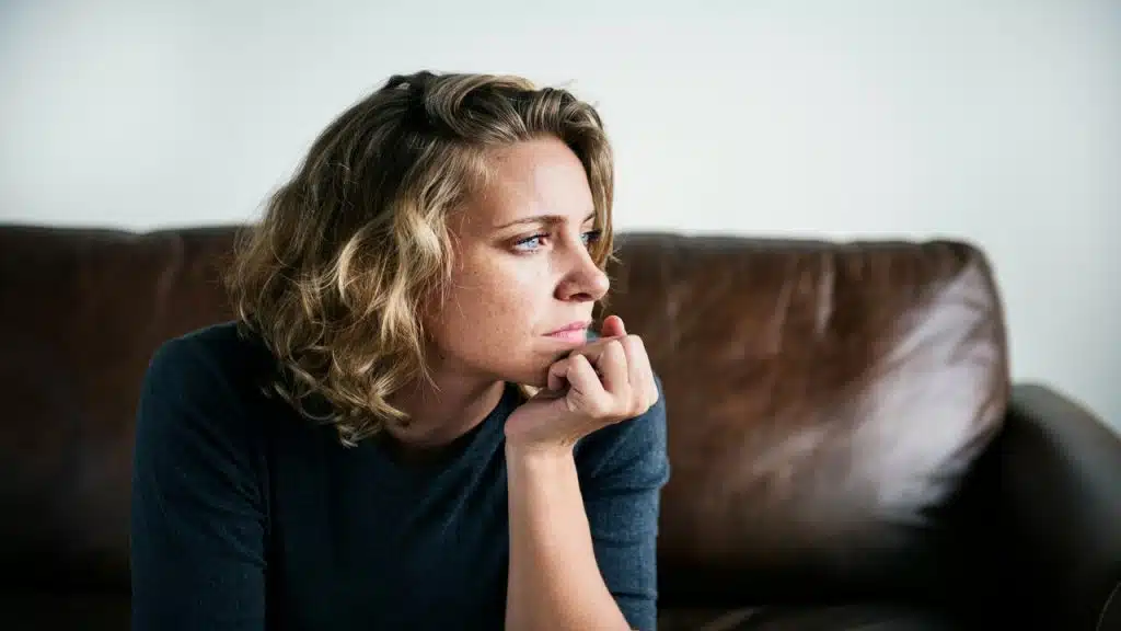 A woman looking disappointed by herself