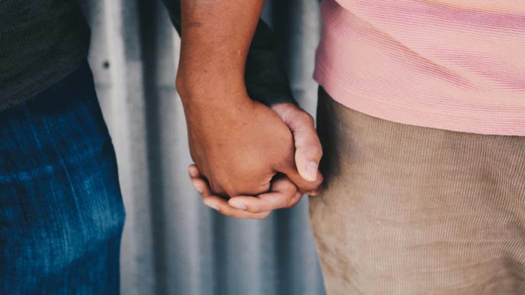 A couple holding hands