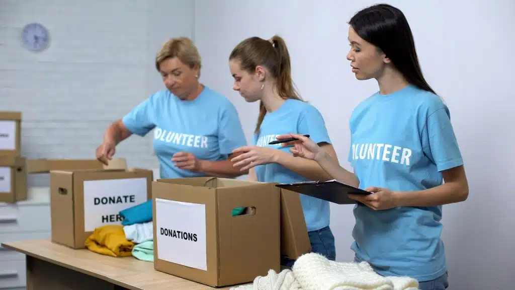 Three women volunteering