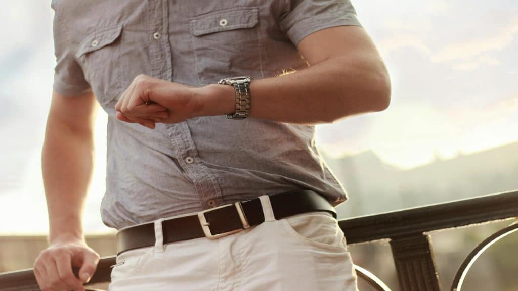 A man checking the time.