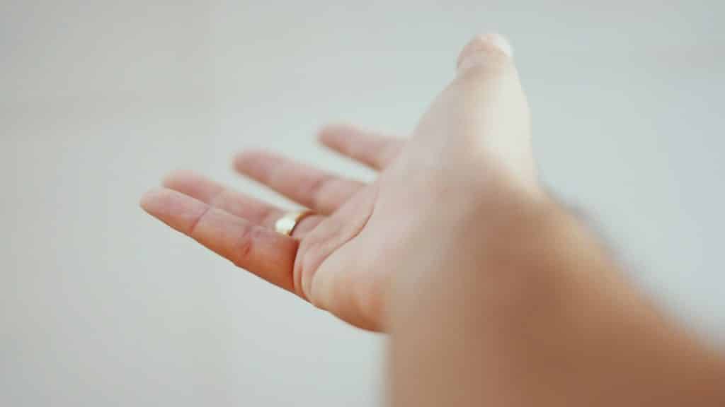 A person holding out their hand