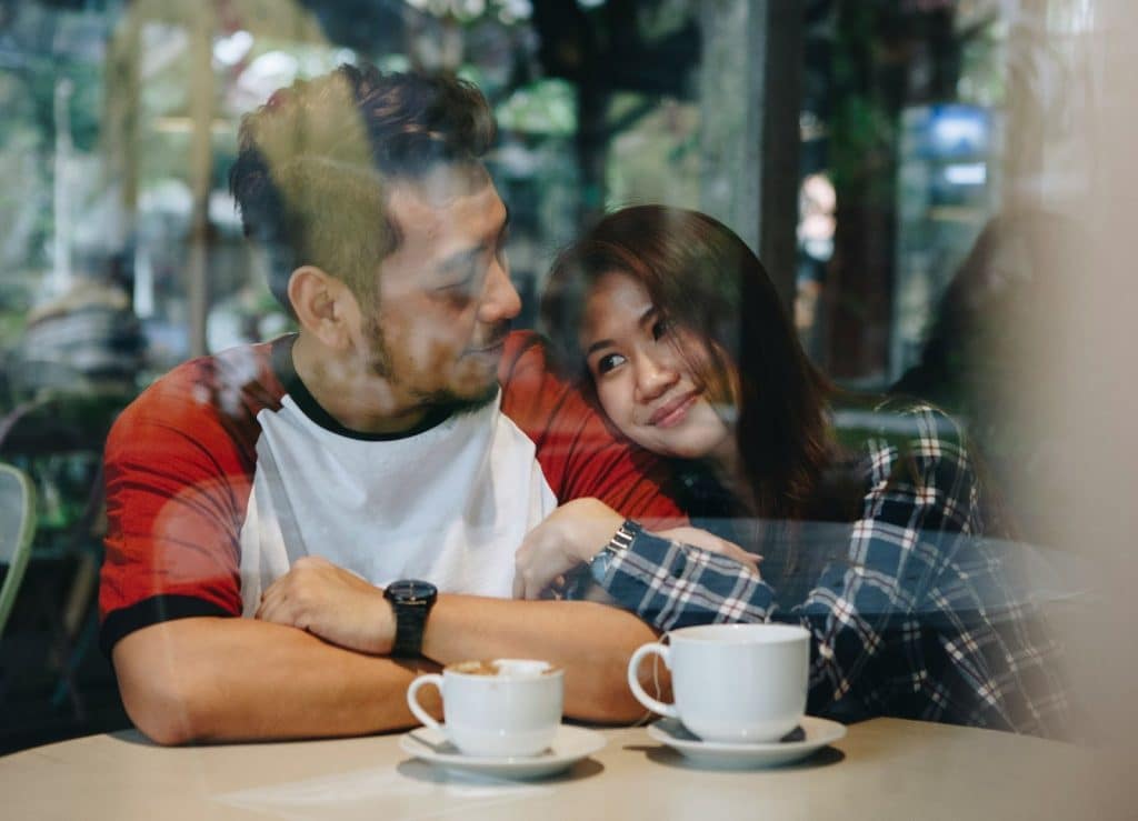 A man complimenting a woman