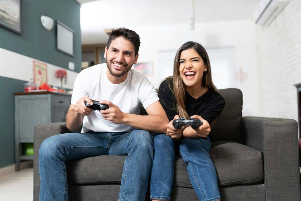 A man and woman playing video games