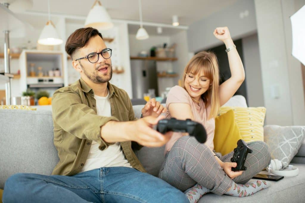 A man and woman enjoying a game