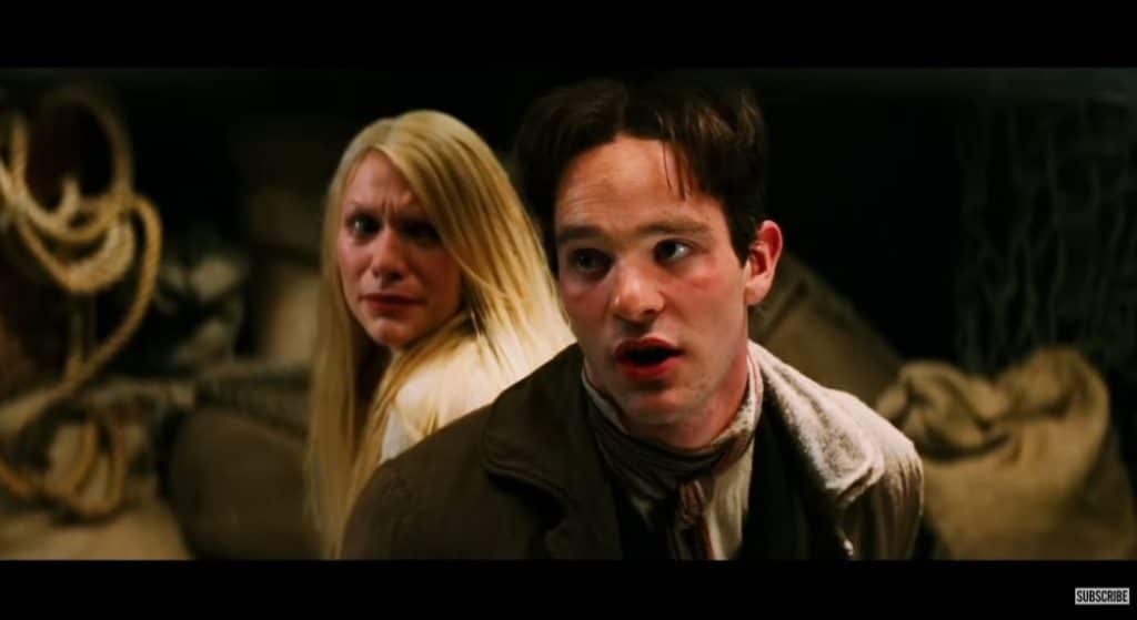 A picture of a man and woman at the movie