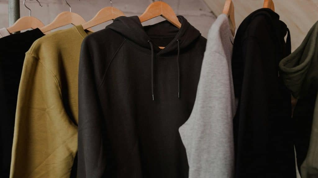 Hoodies hanging on a rack