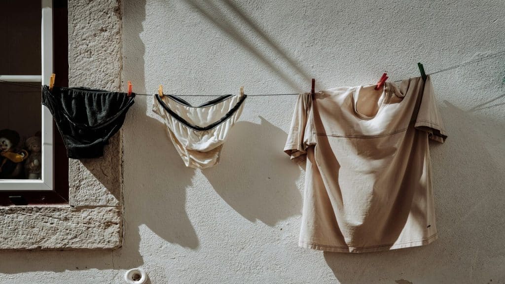 A photo of old underwear being sun dried