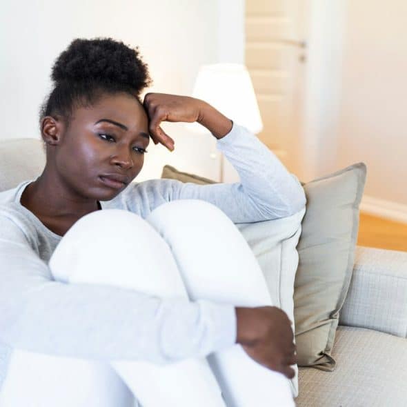 A woman looking disappointed.