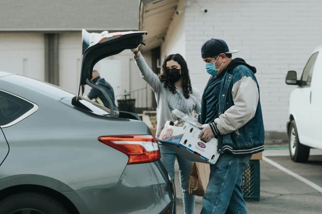 A man helping a woman