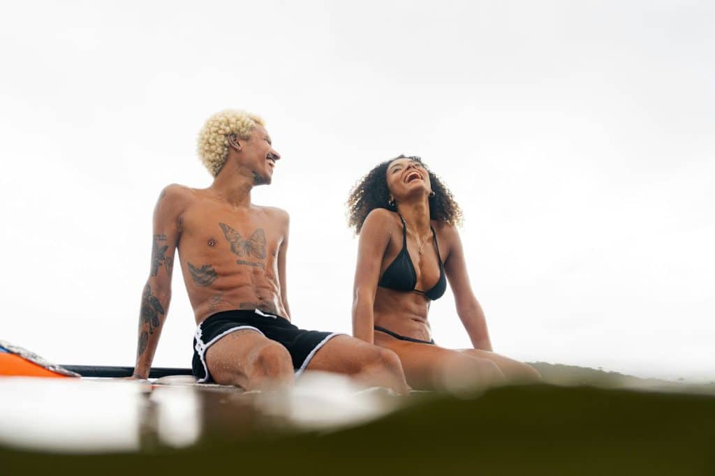 A man and woman laughing together