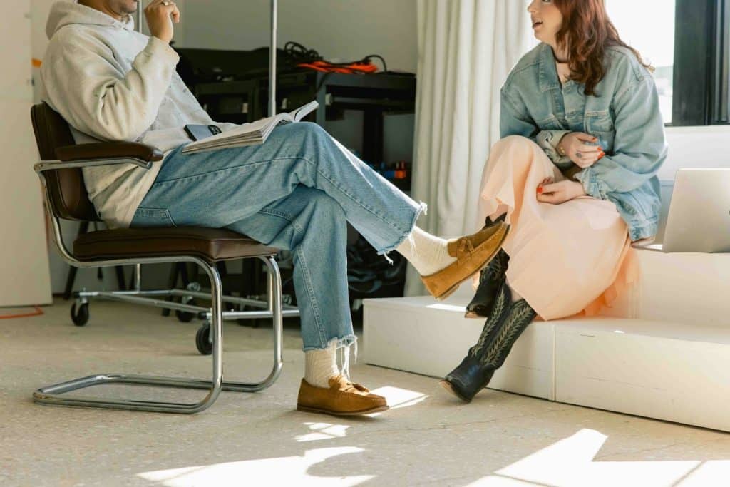 A man and woman talking 