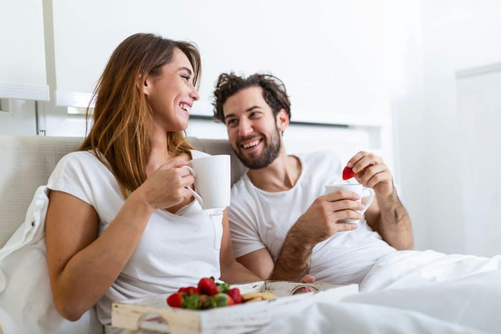 A man and woman having a coffee on the morning