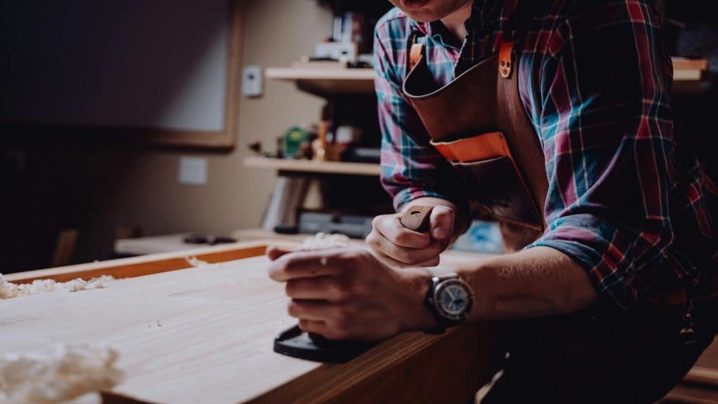 A man doing some woodworking.