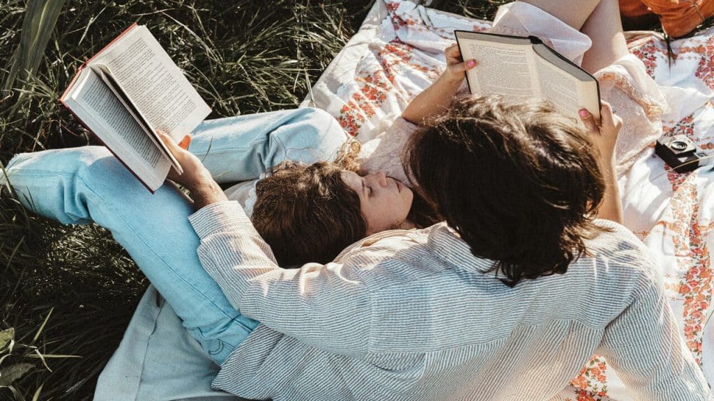 A couple reading together.