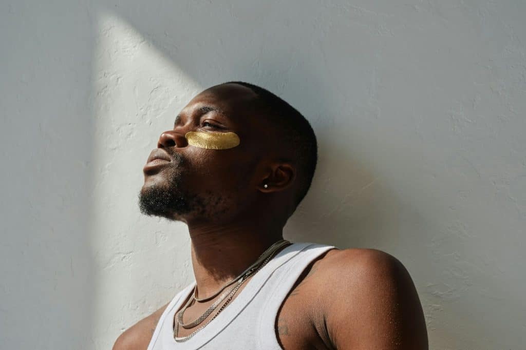 A man using an eyebag patch