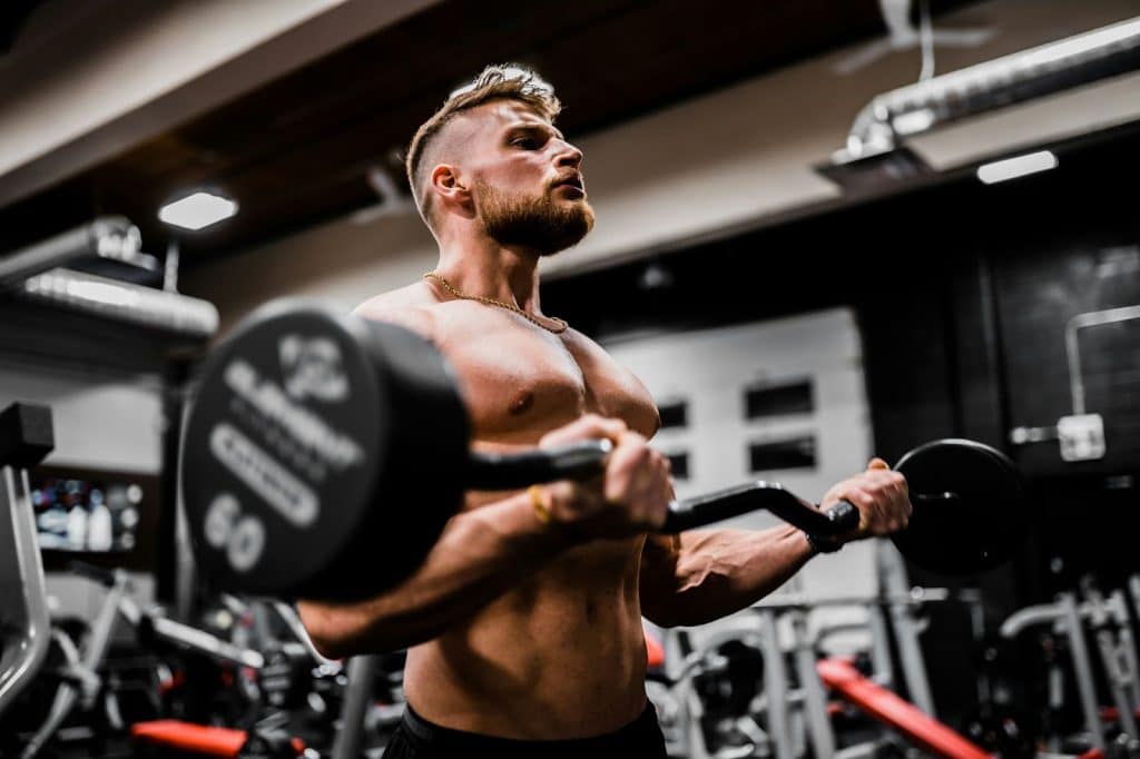 A man carrying a barbell