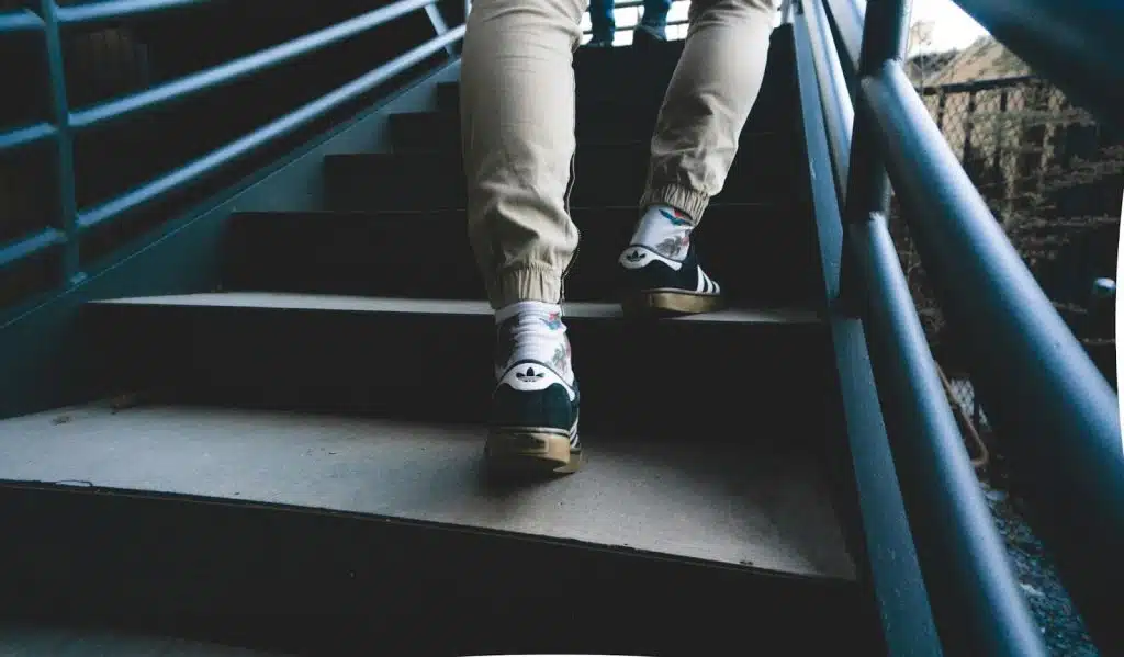 A person climbing on the stairs