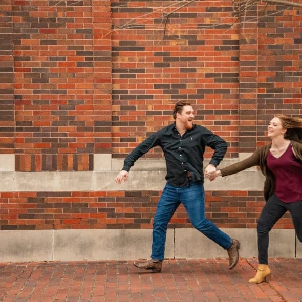 A man and woman running