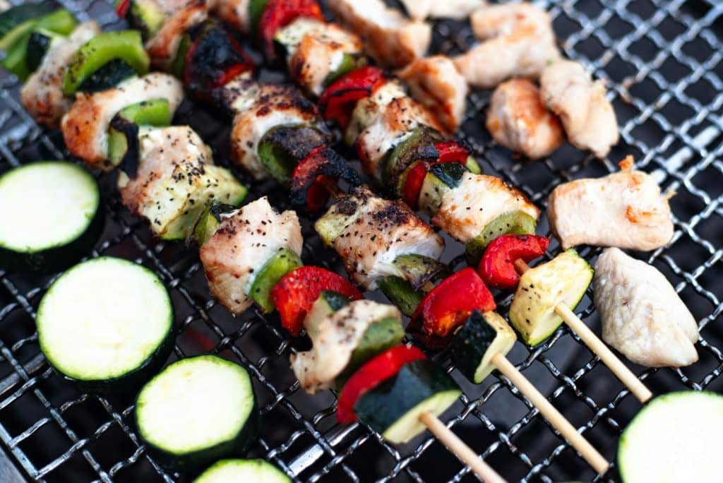 A picture of chicken and veggie skewers