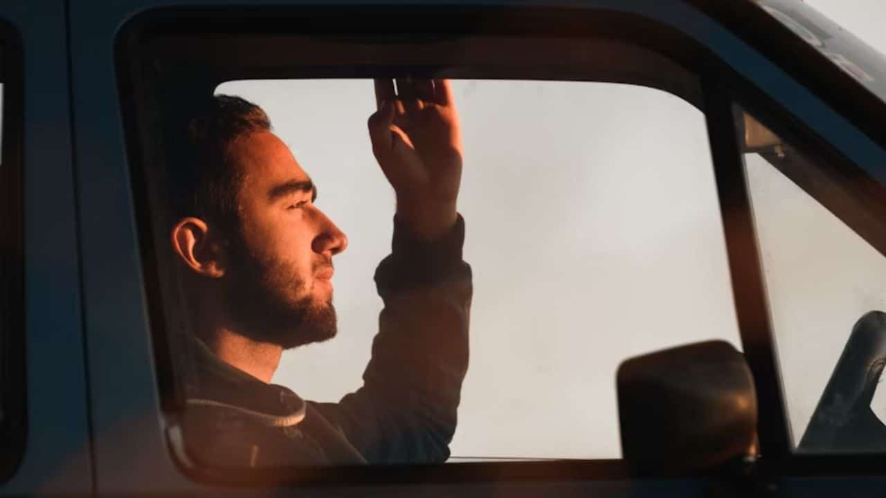 Man emotionally distant and processing his decision to move on.