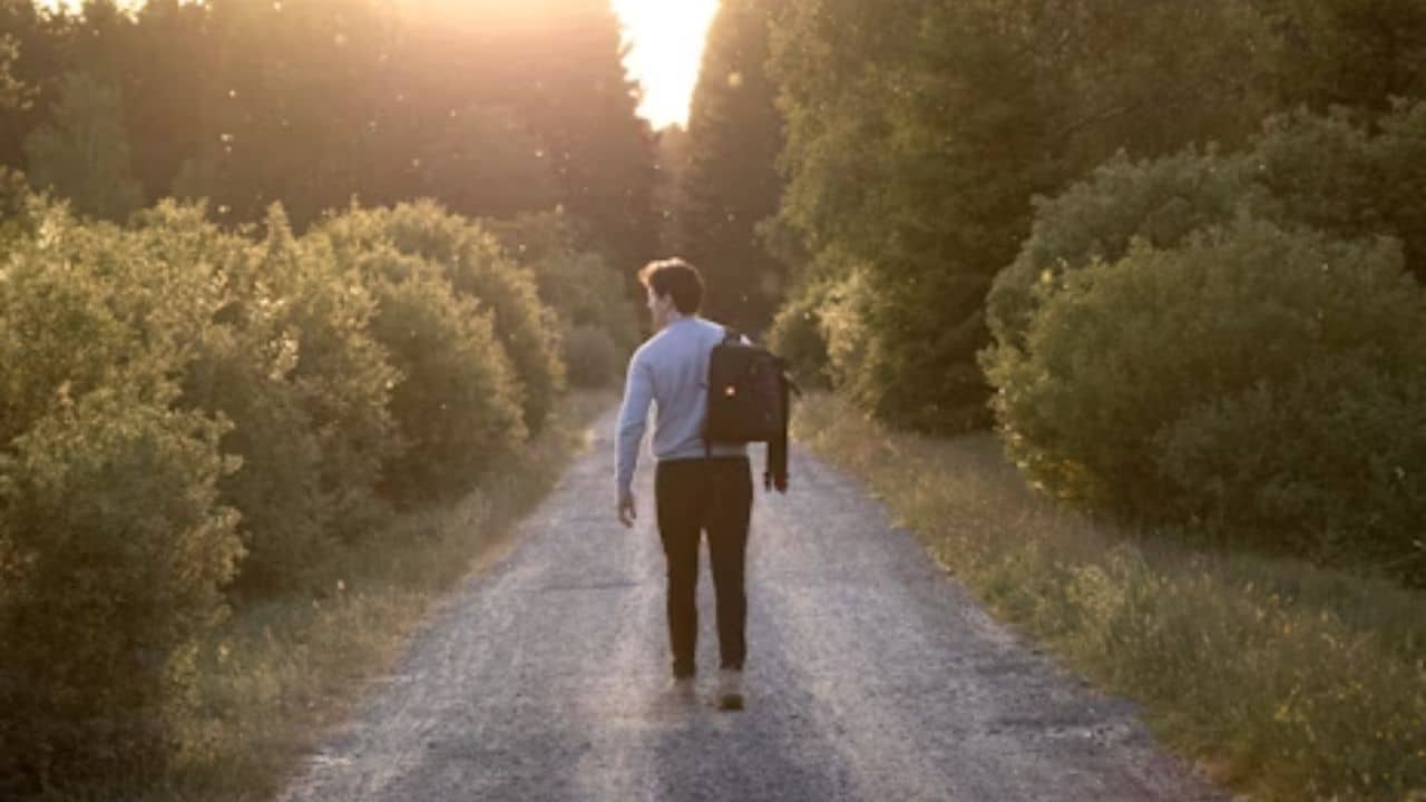 Man stepping into a new chapter with quiet strength and self respect.