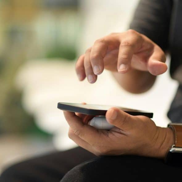 A person using a smartphone.