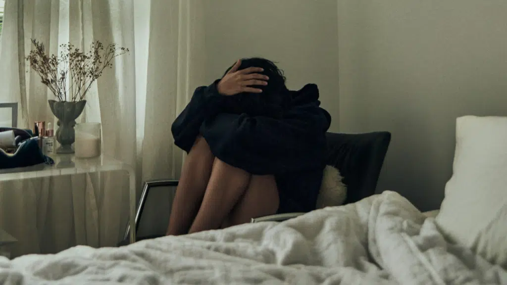 A woman alone at home.