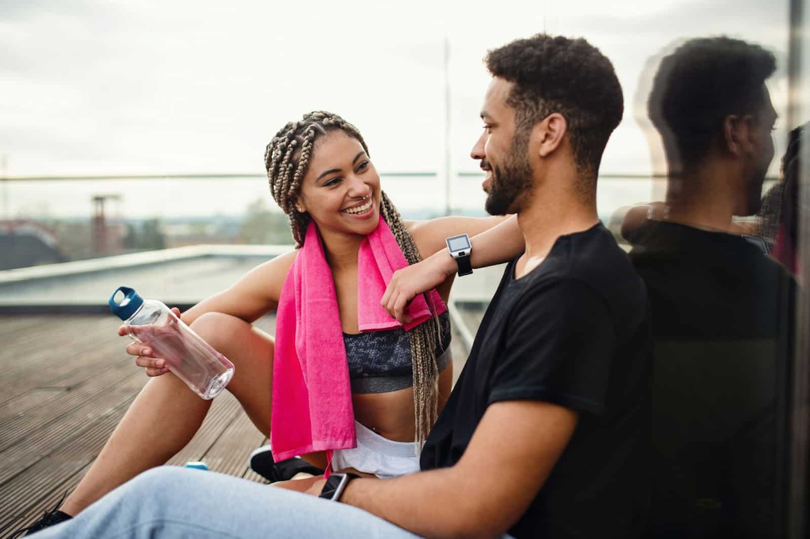 A man listening to a woman.