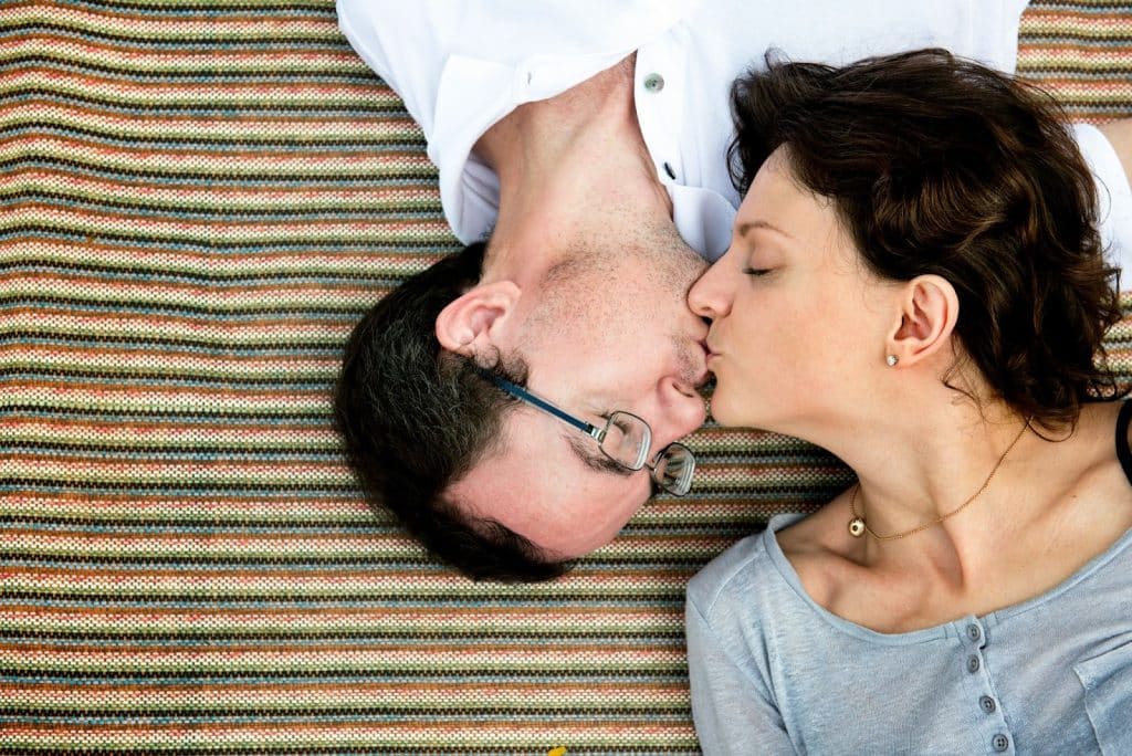 A man and woman kissing