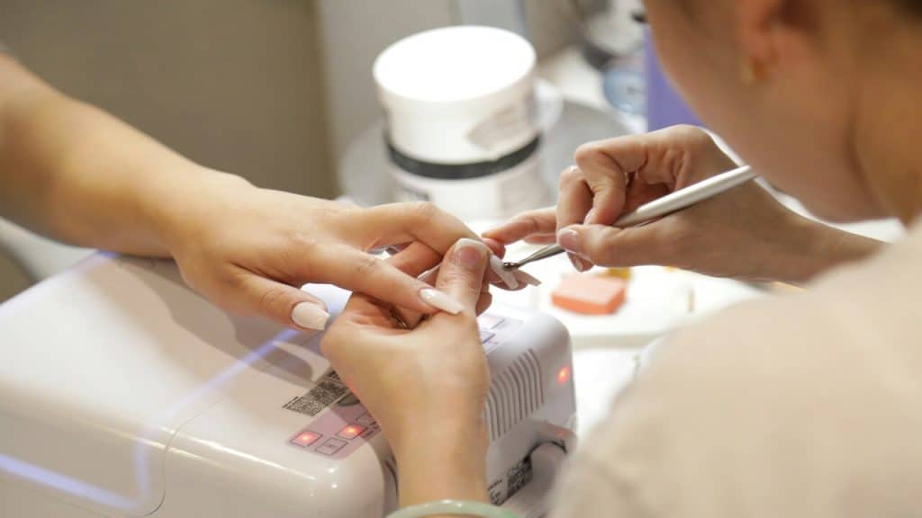 A woman getting a manicure