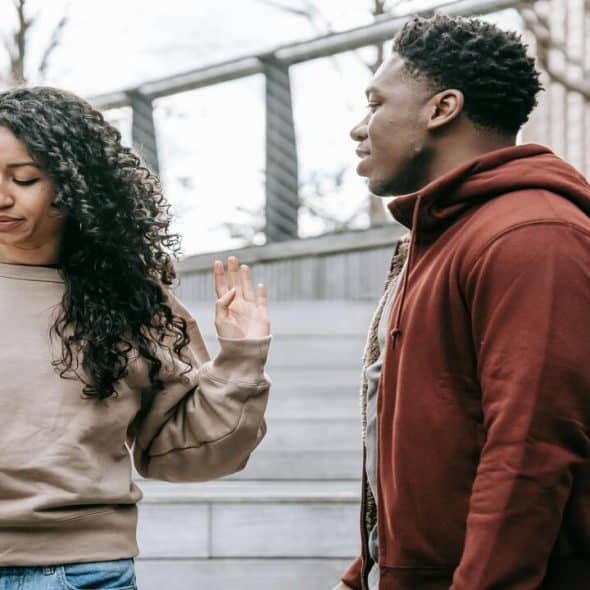 A couple arguing on the street