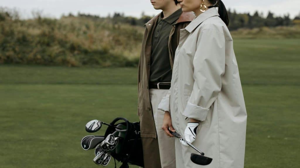 A couple golfing together.