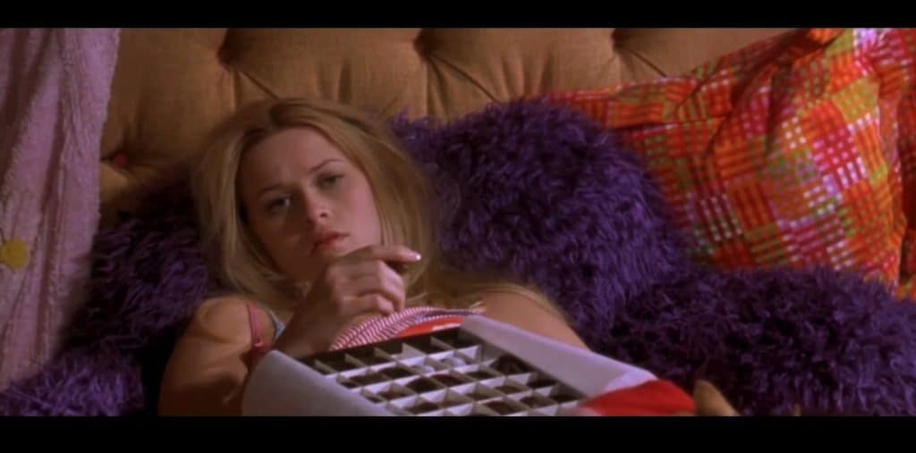 A woman looking bored.