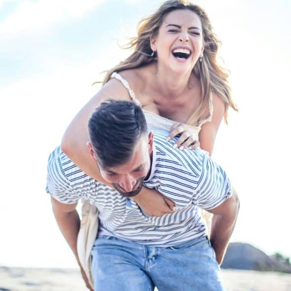A man and woman having fun.