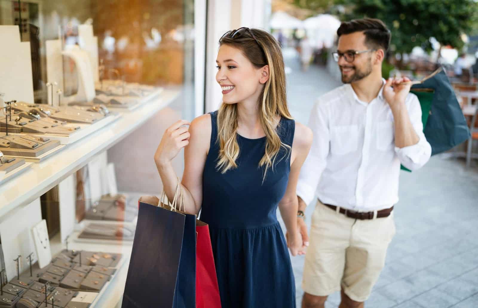 A man and woman shopping.