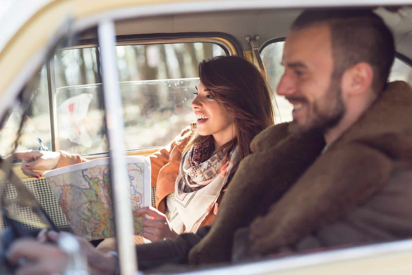 A man and woman in the car.