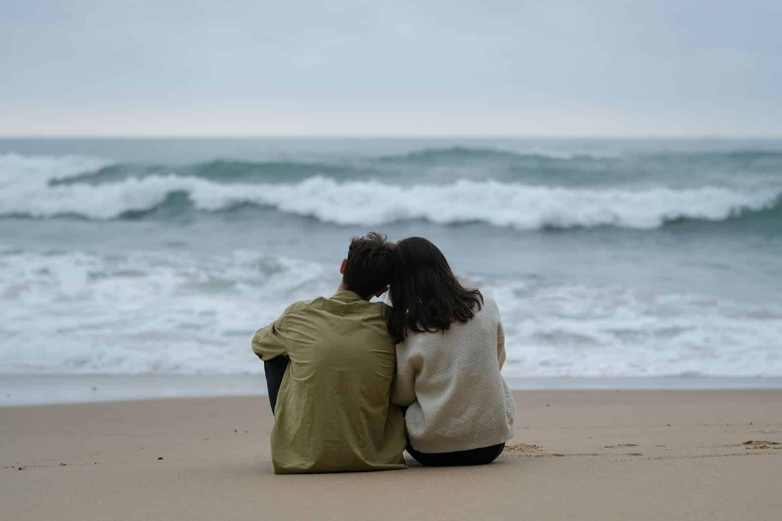 A man and woman at the beach.