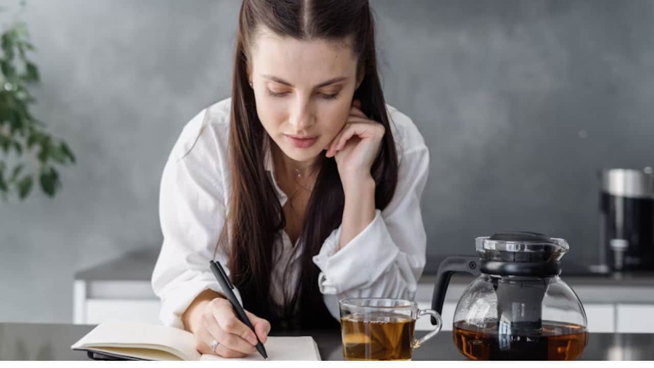 Woman protecting her peace through journaling.