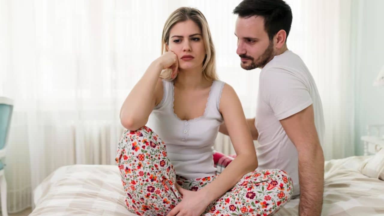 Woman waiting for husband to change.