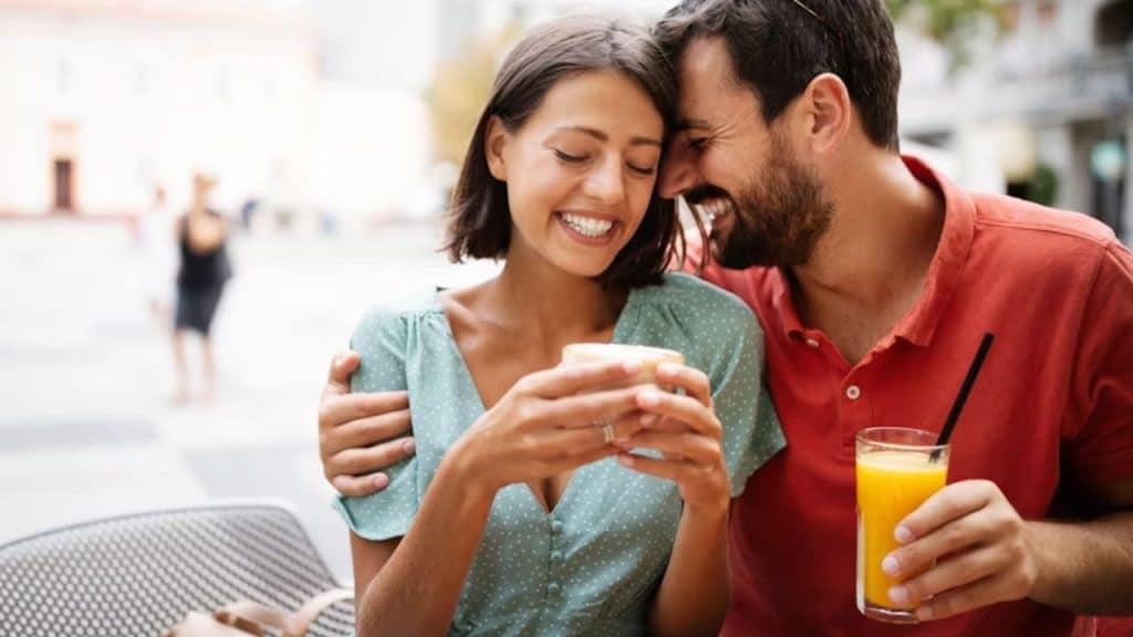 Young couple on a romantic date in a cafe.