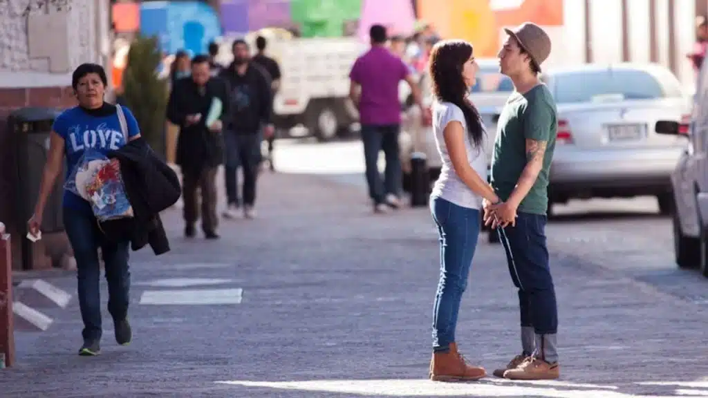Man being proud to claim his partner in public.