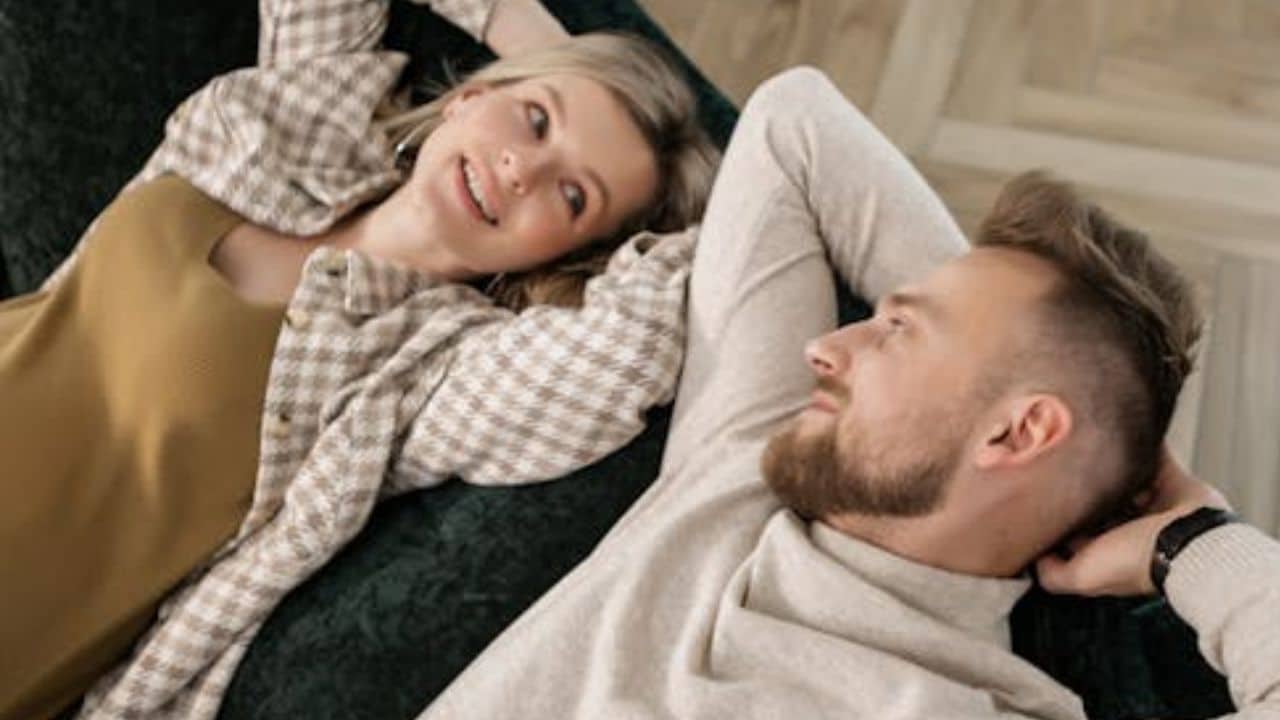 Couple relaxing on the floor.
