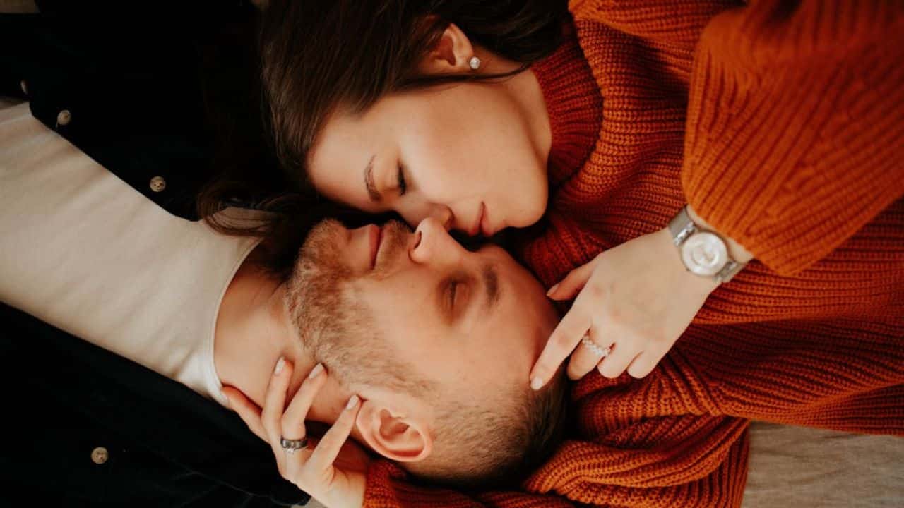 Couple sharing emotional intimacy through closeness and touch.